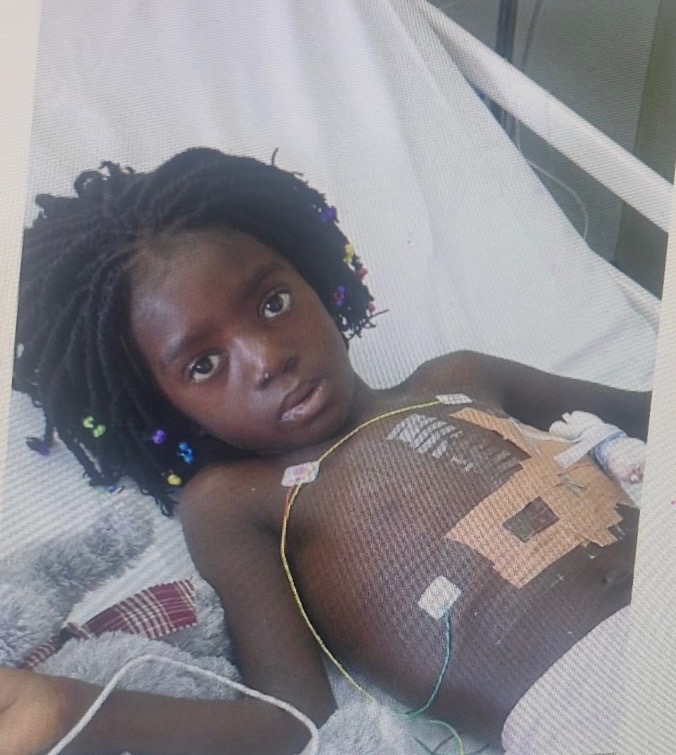 Annette receiving care in a hospital bed